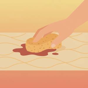 یک دست با ابر درحال پاک کردن لکه خون